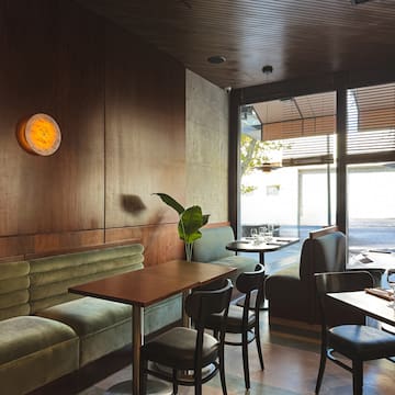 a restaurant with tables and chairs