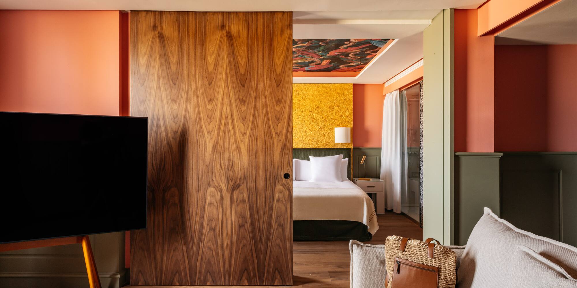 a room with a door and a couch