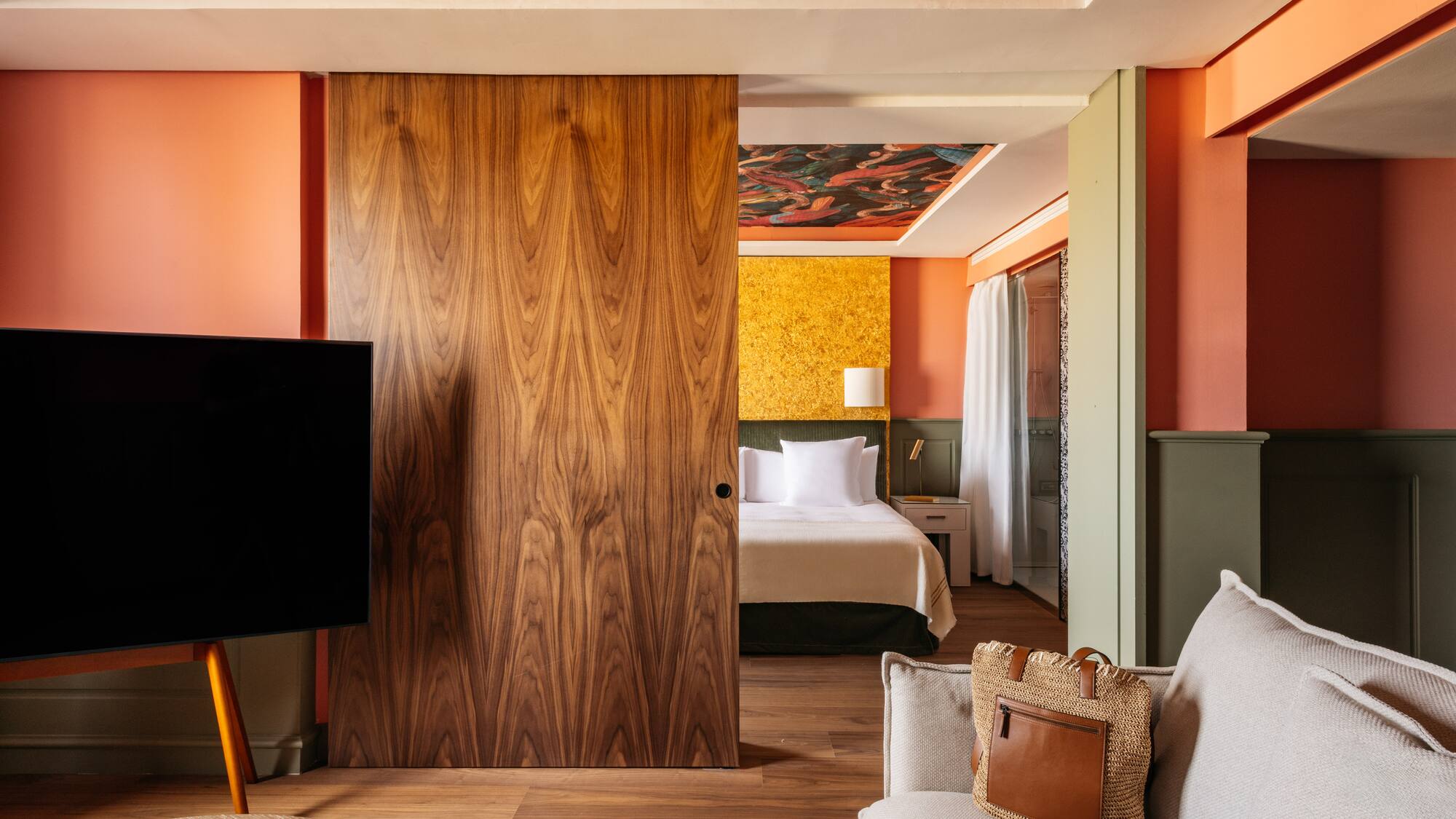 a room with a door and a couch