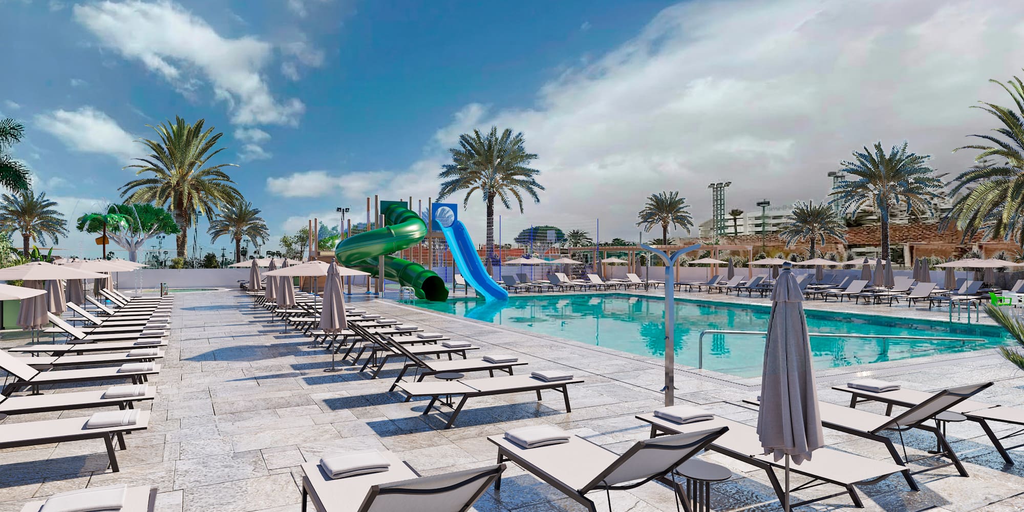 a pool with lounge chairs and a slide
