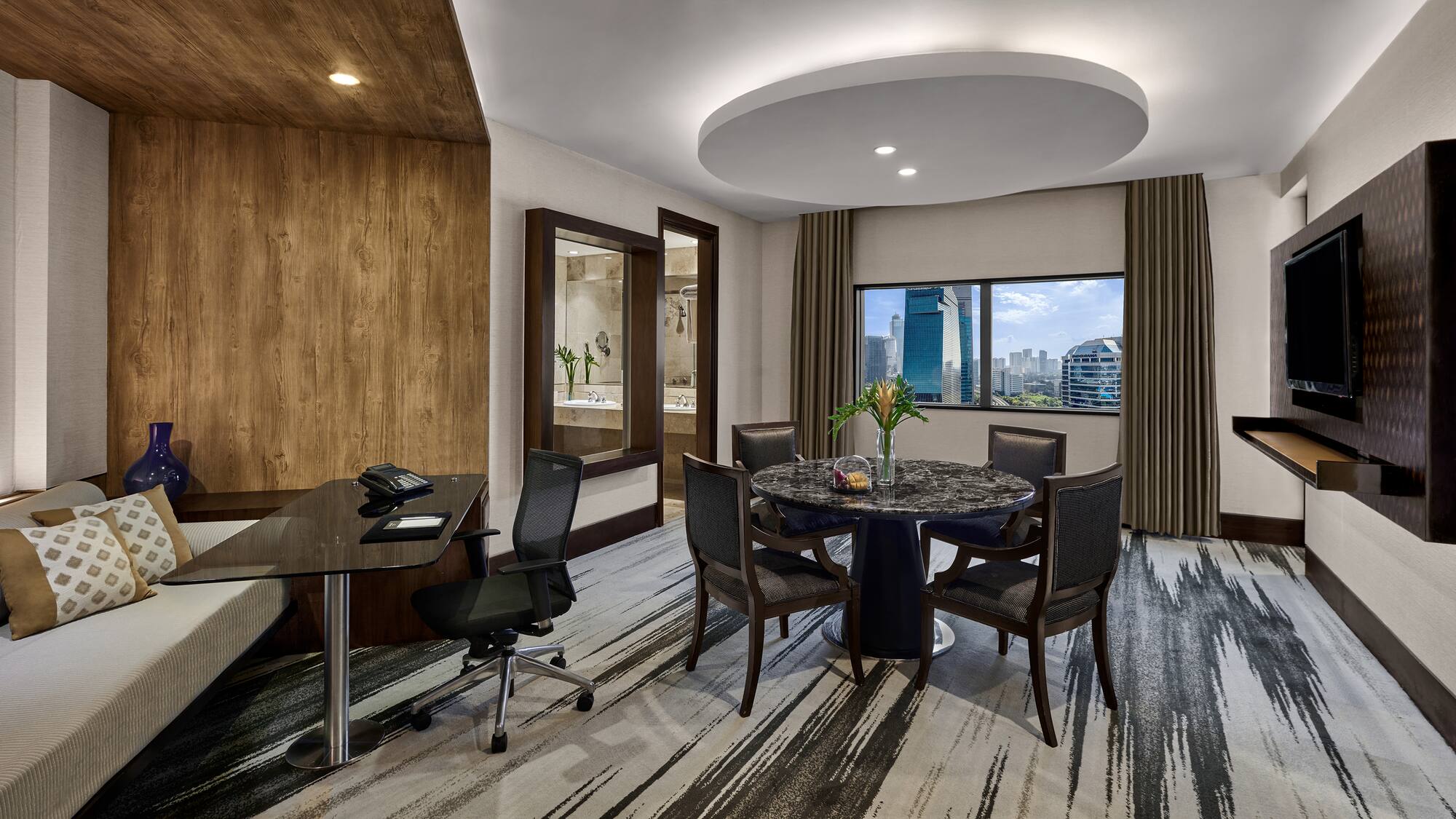 a room with a table and chairs