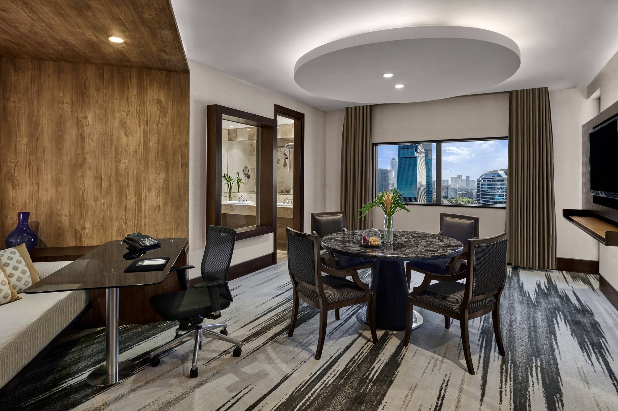 a room with a table and chairs