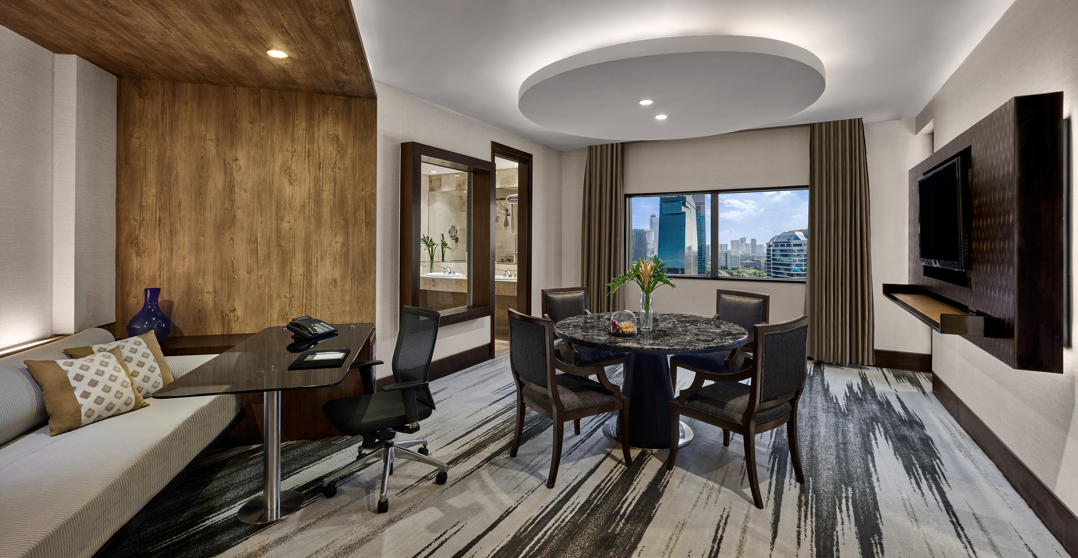 a room with a table and chairs