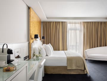 a room with a bed and a desk