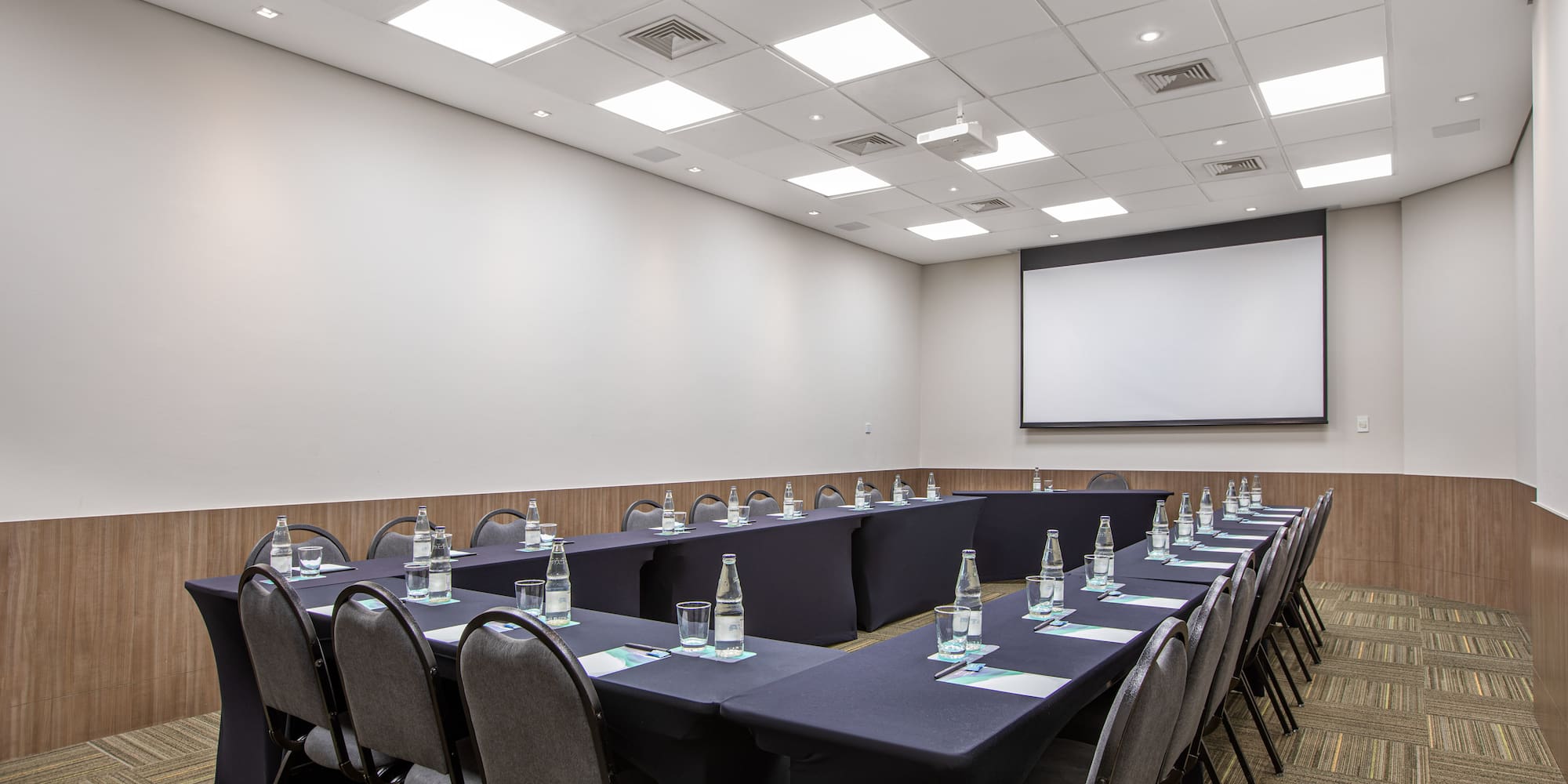 a room with tables and chairs
