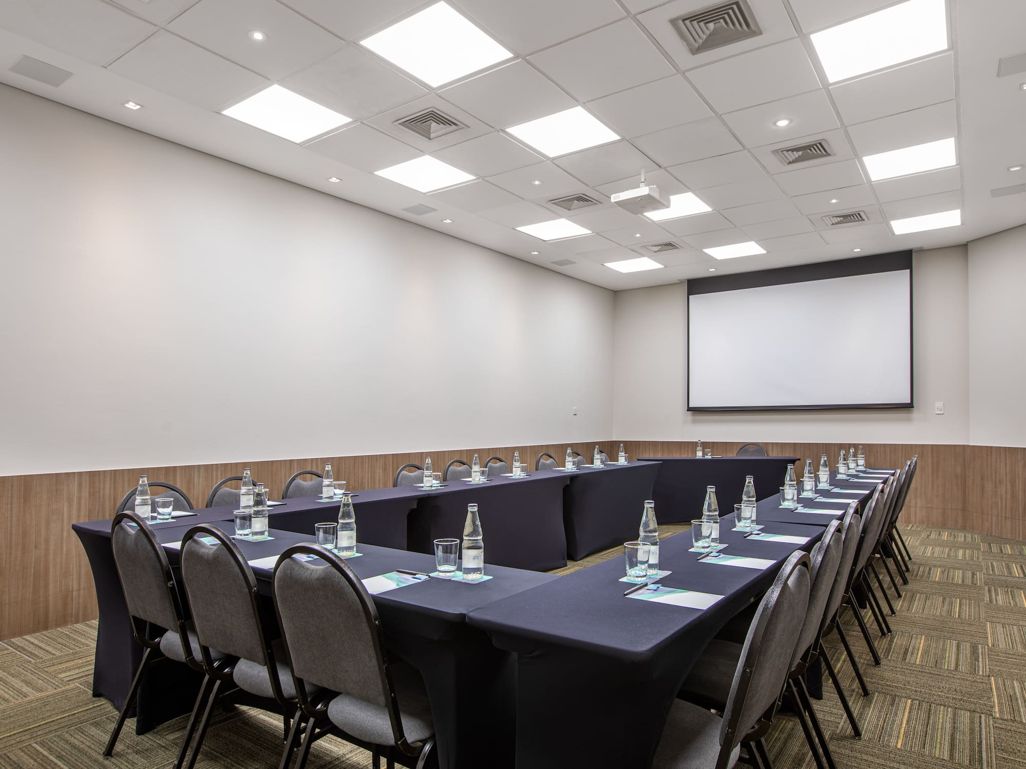 a room with tables and chairs