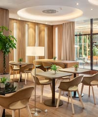 a room with tables and chairs