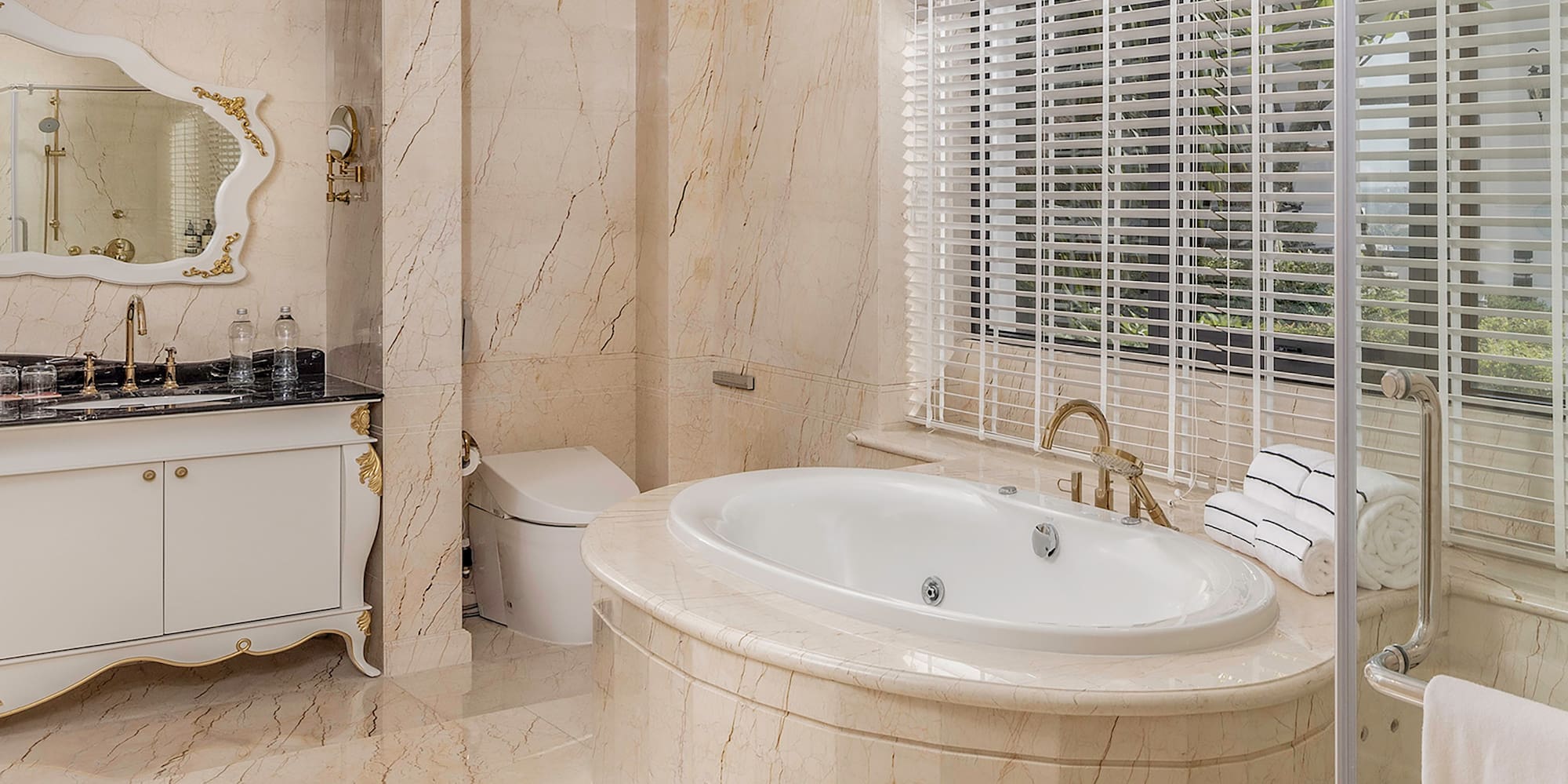 a bathroom with a tub and a shower