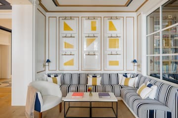 a room with a couch and a coffee table