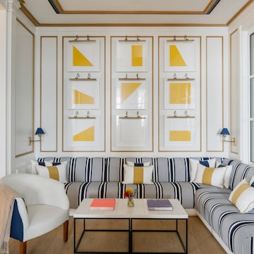 a room with a couch and a coffee table