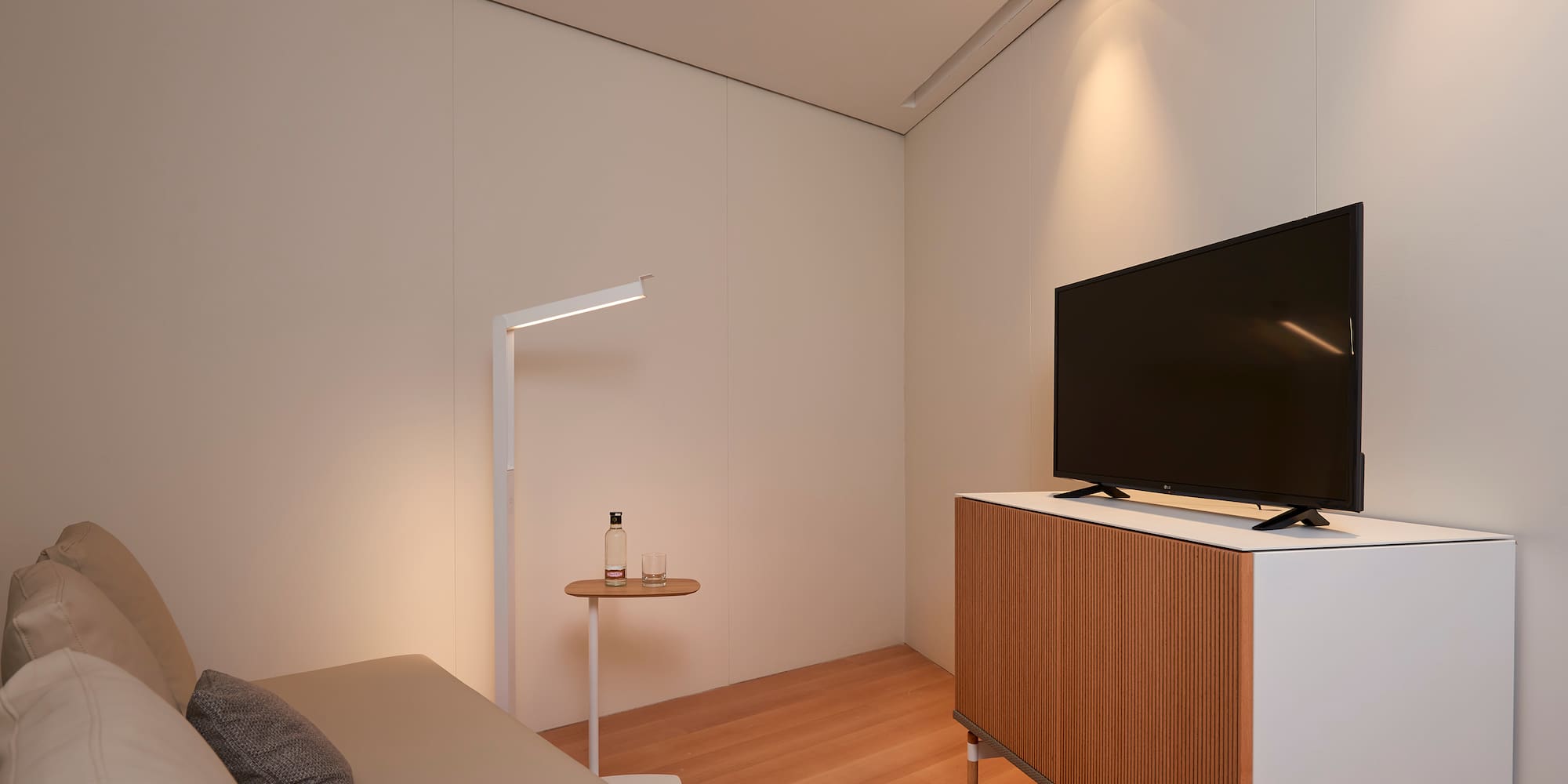 a tv on a cabinet in a room