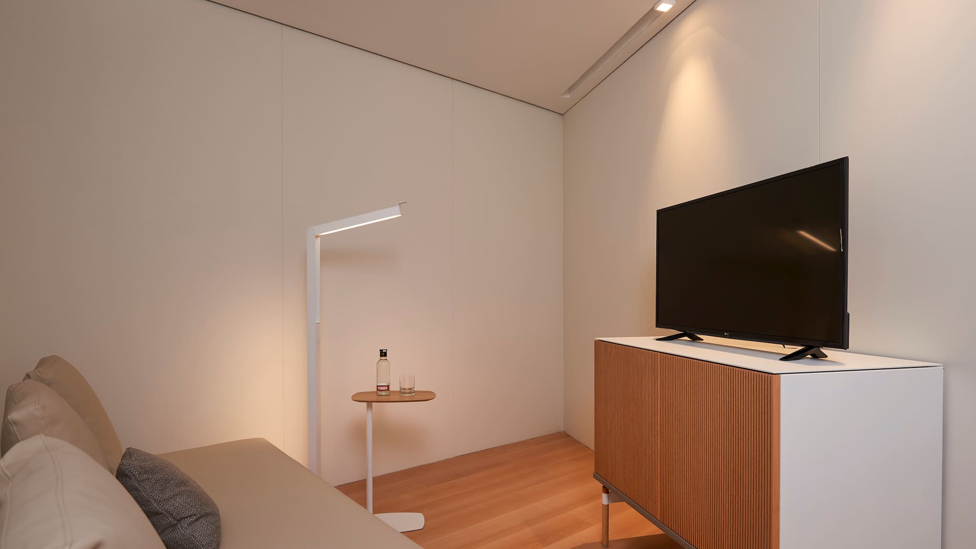 a tv on a cabinet in a room