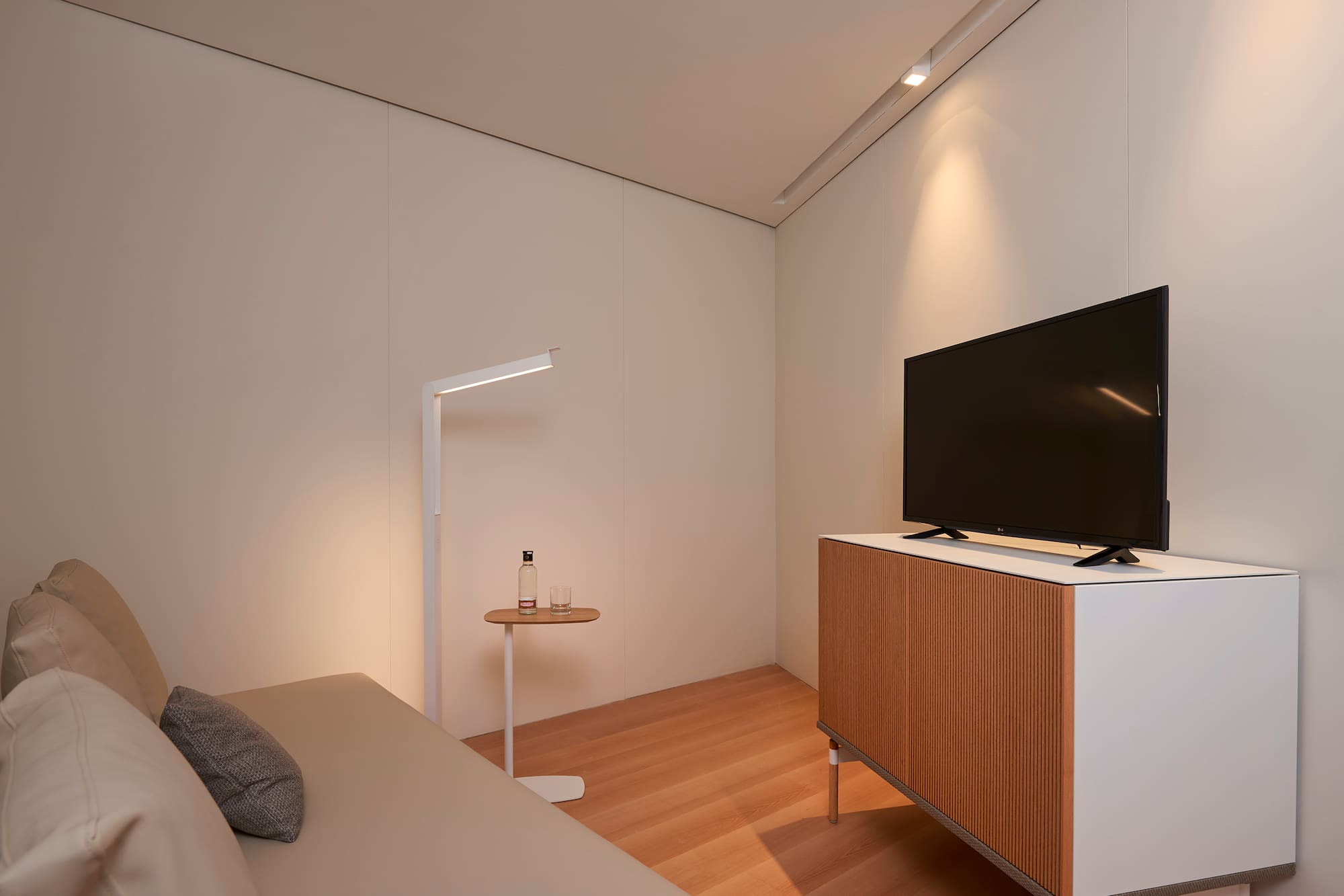 a tv on a cabinet in a room