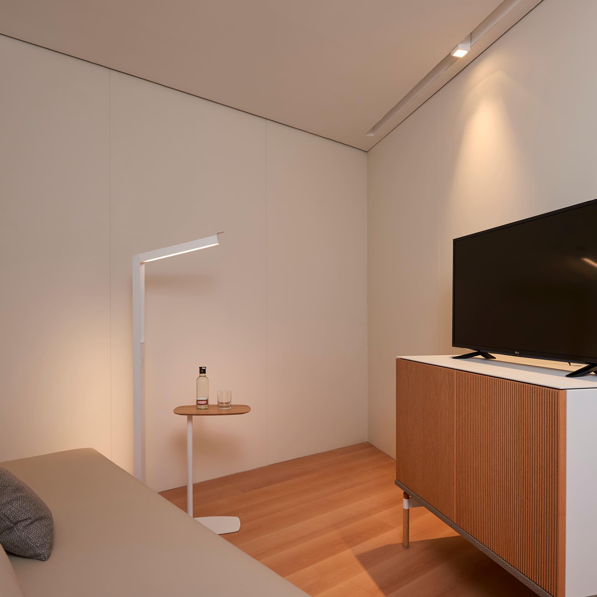 a tv on a cabinet in a room