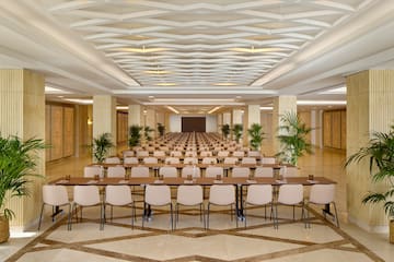 a room with tables and chairs