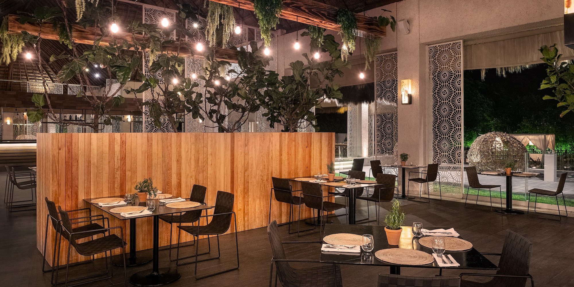 a restaurant with tables and chairs