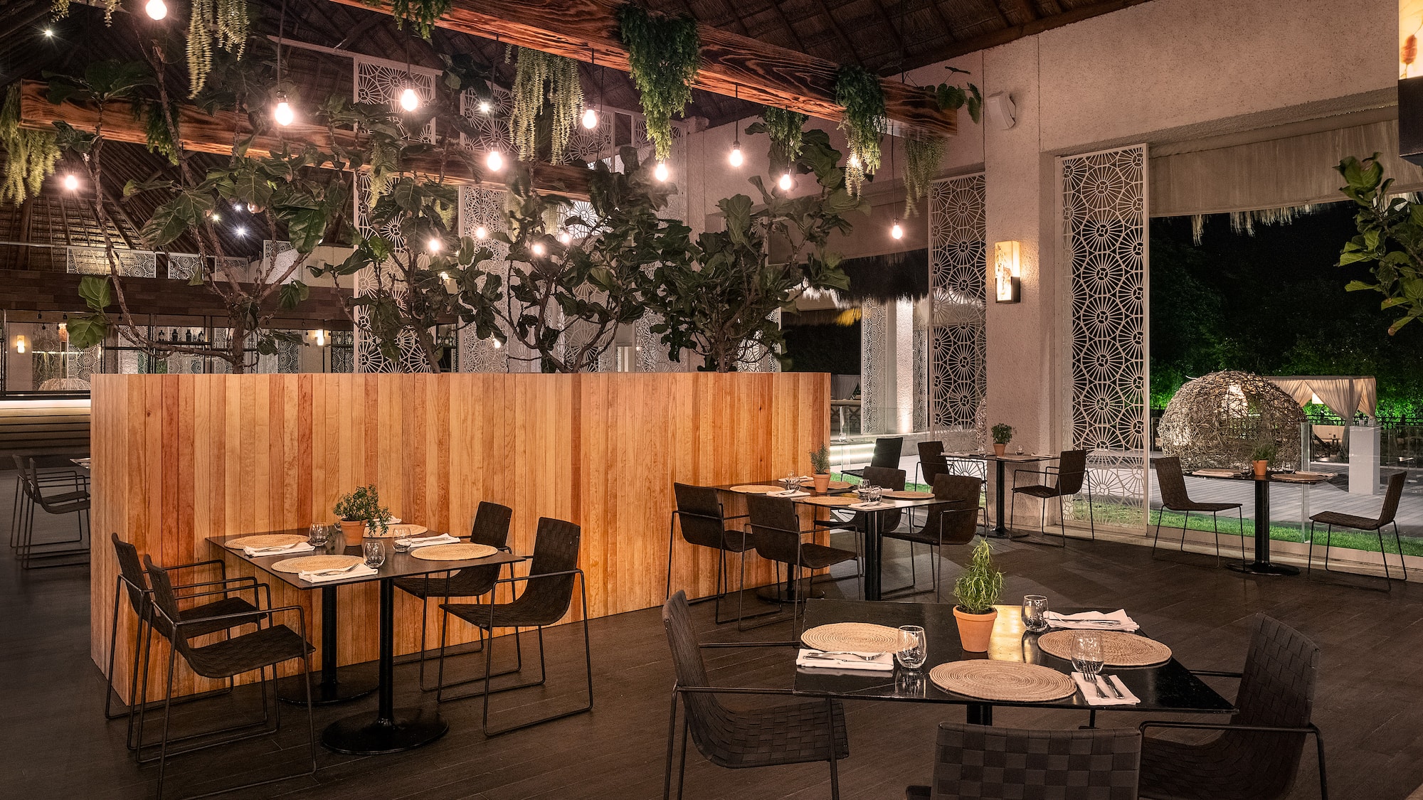 a restaurant with tables and chairs