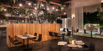 a restaurant with tables and chairs