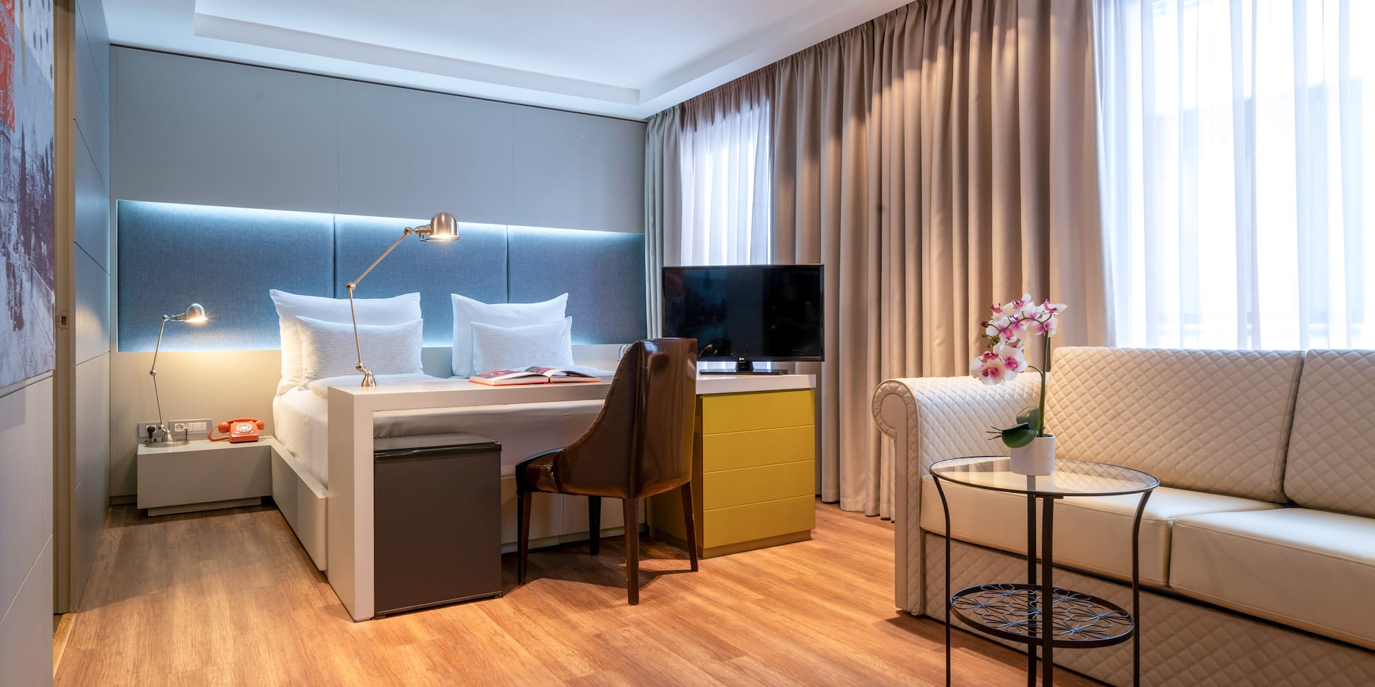 a room with a bed and a chair