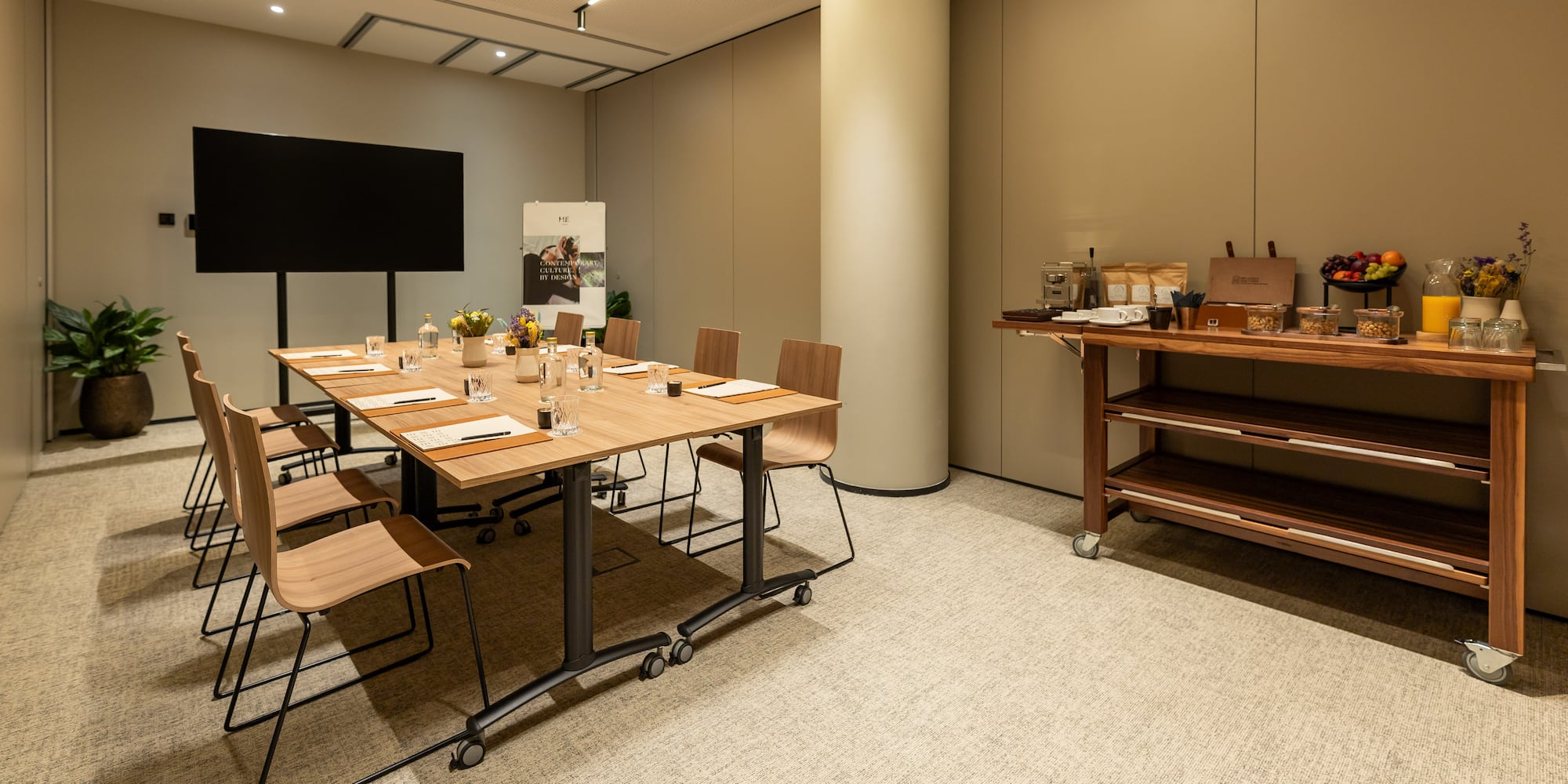 a room with a table and chairs