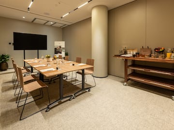 a room with a table and chairs