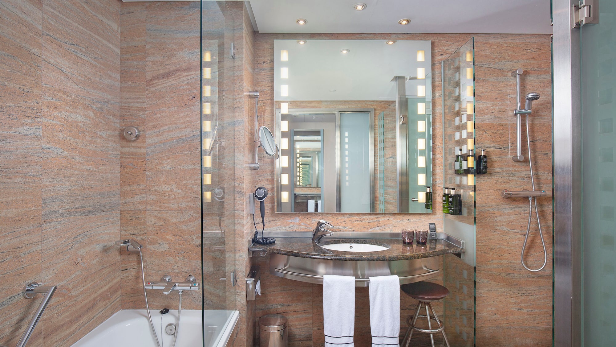 a bathroom with a sink and a shower