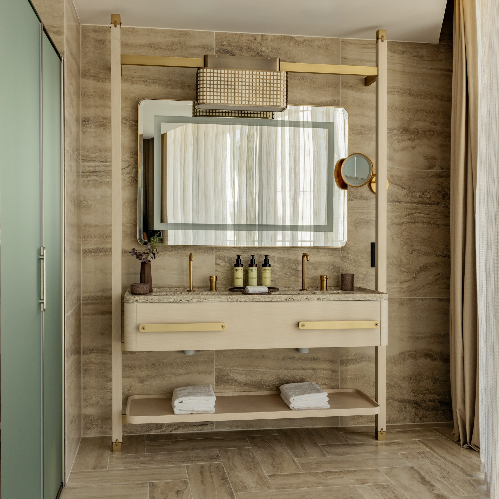 a bathroom with a mirror and sink