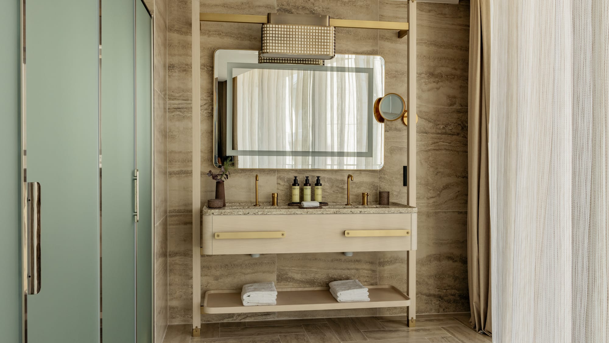 a bathroom with a mirror and sink