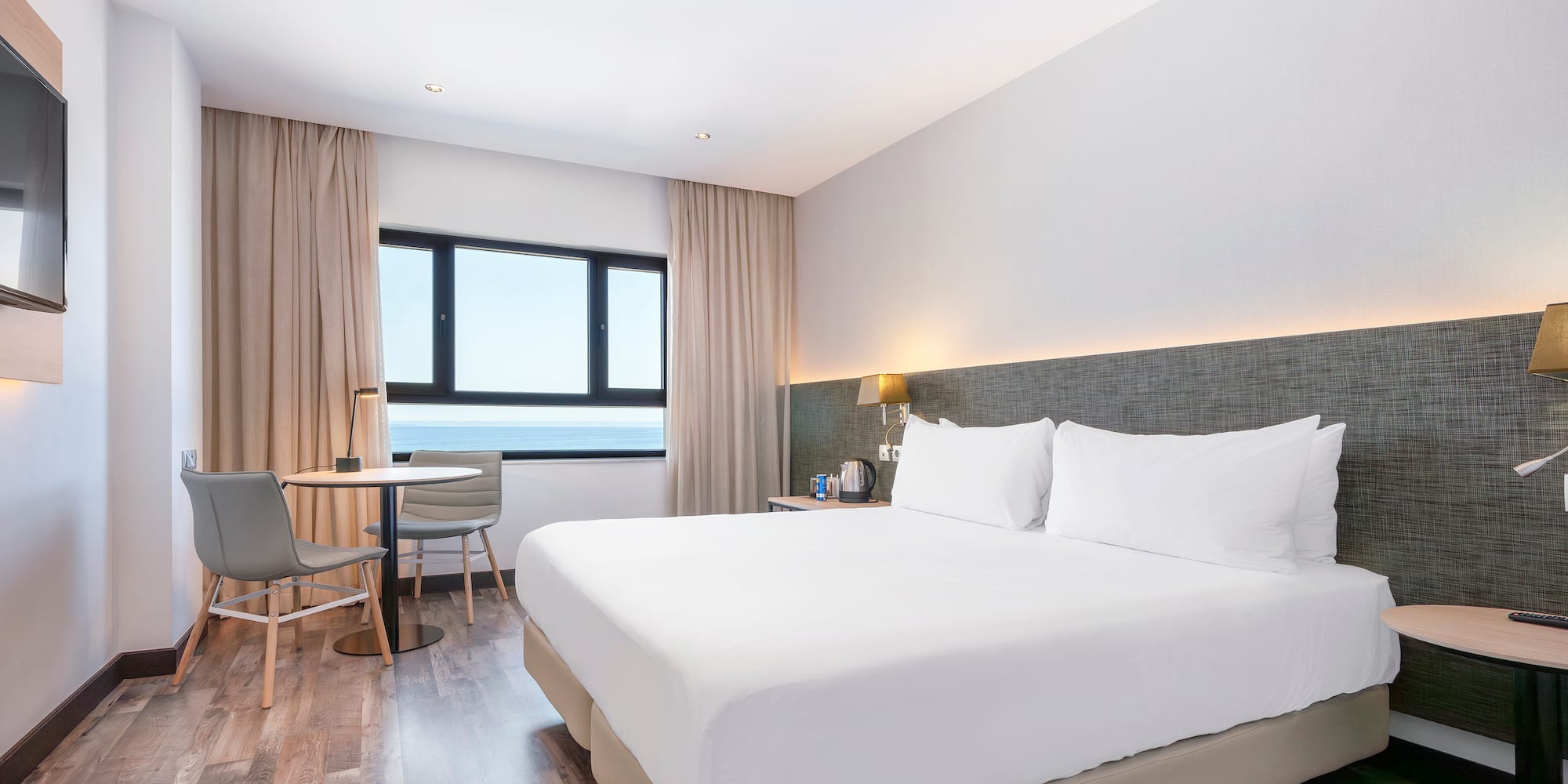 a room with a bed and a table