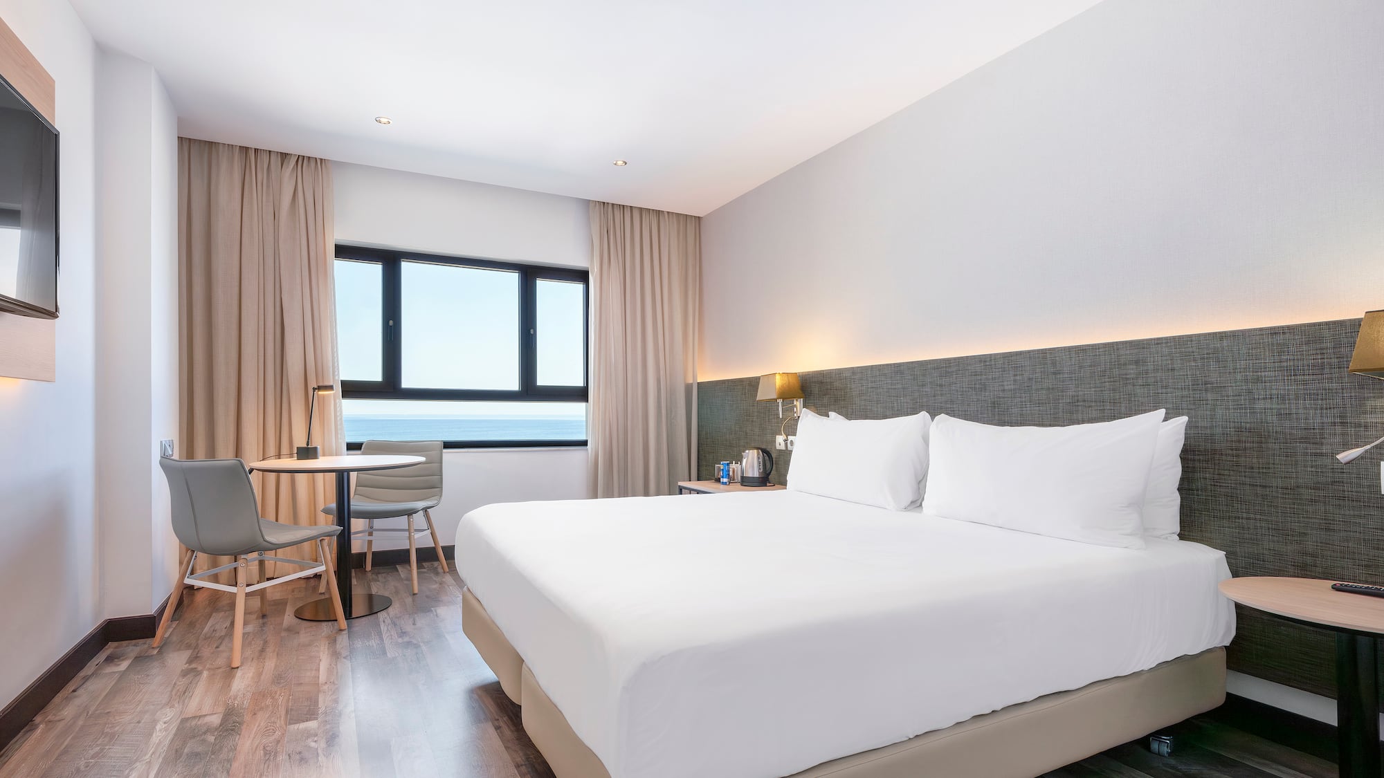 a room with a bed and a table