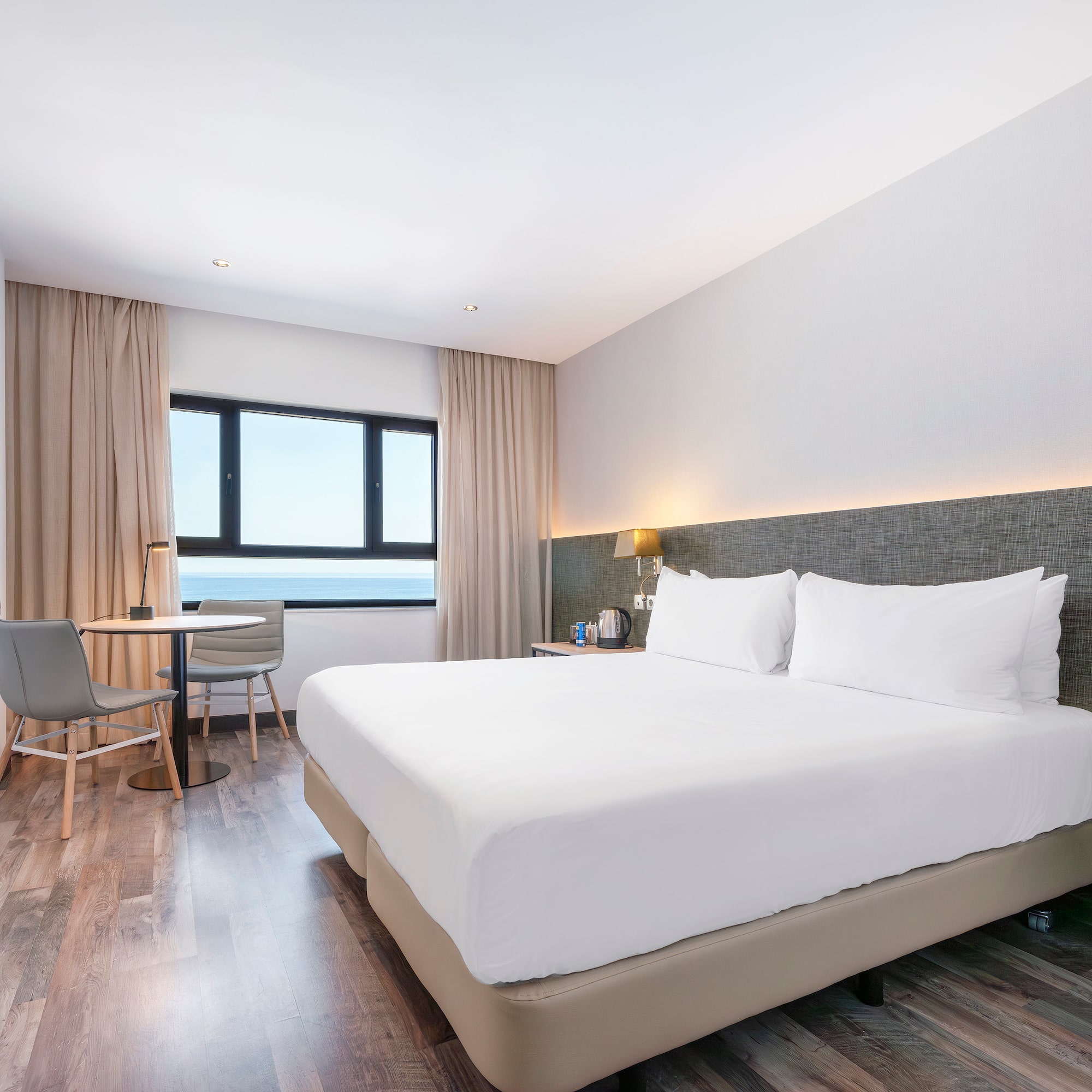 a room with a bed and a table