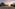 Luxury beach resort sunset: modern hotel, sandy beach, umbrellas, calm ocean.