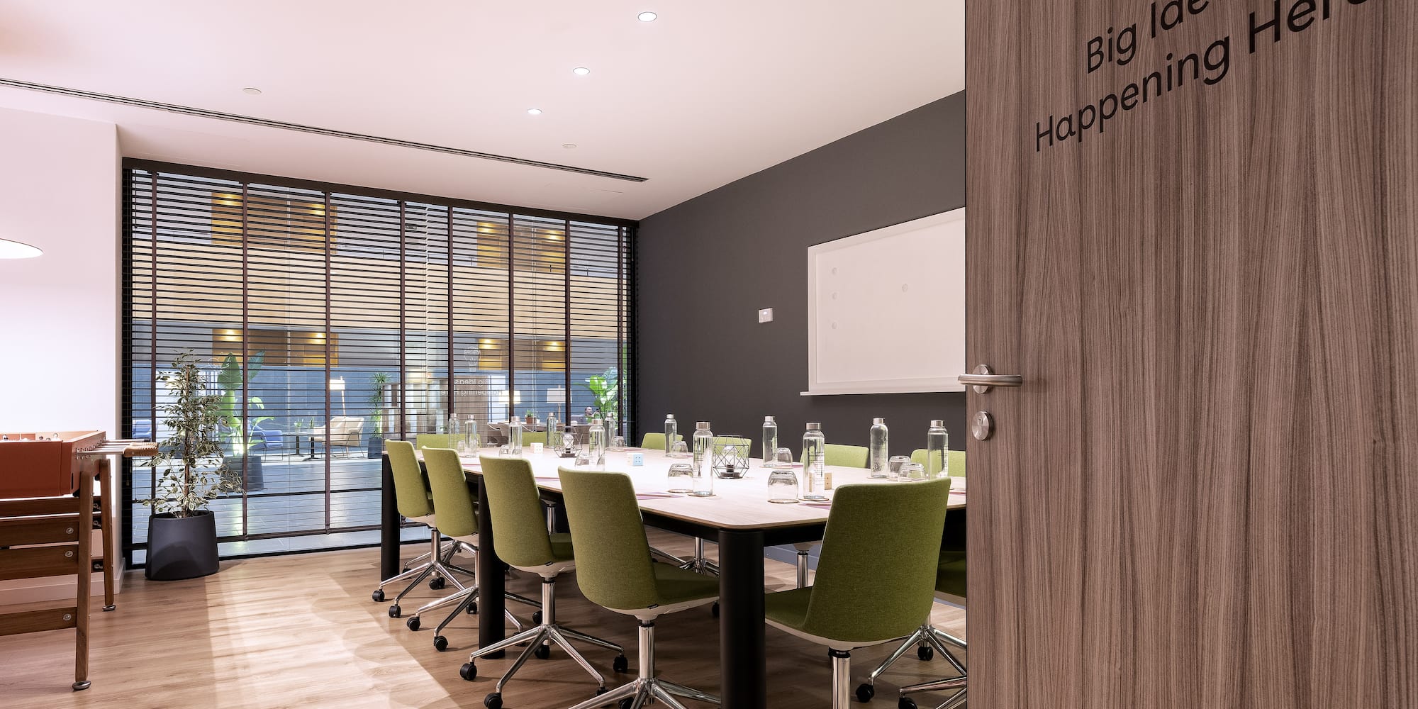 a room with a table and chairs