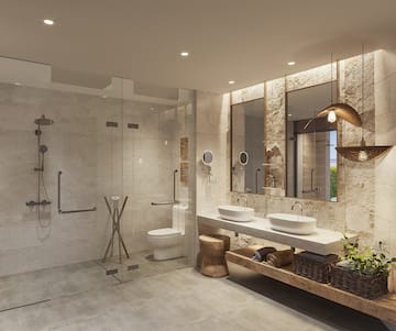 a bathroom with a shower and sinks