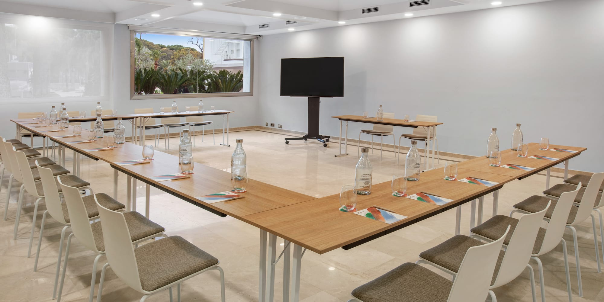 a room with tables and chairs