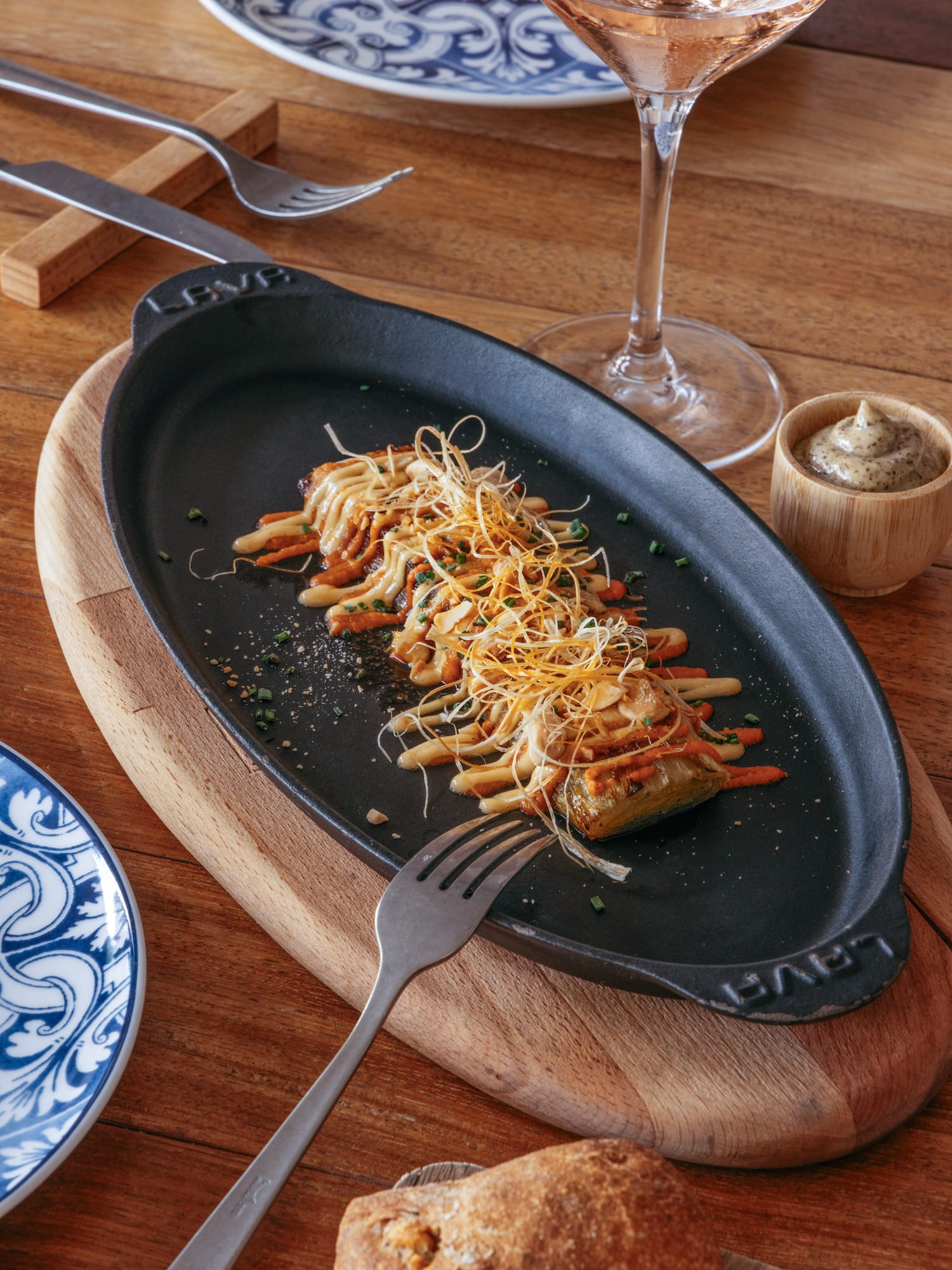 a plate of food on a wooden surface