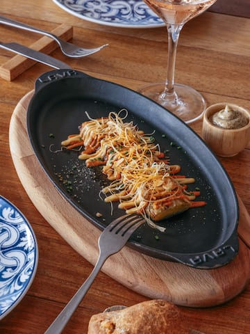 a plate of food on a wooden surface