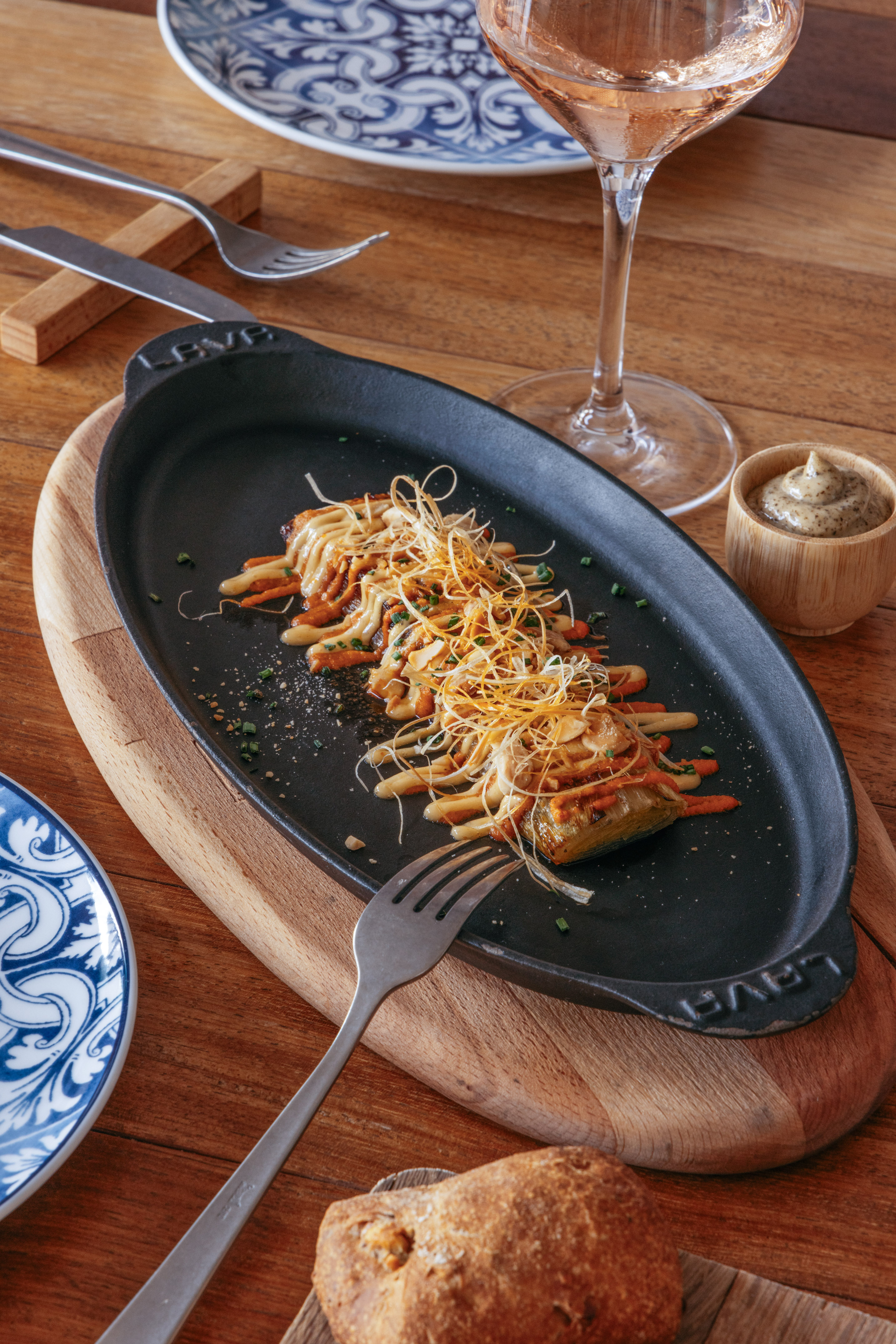 a plate of food on a wooden surface