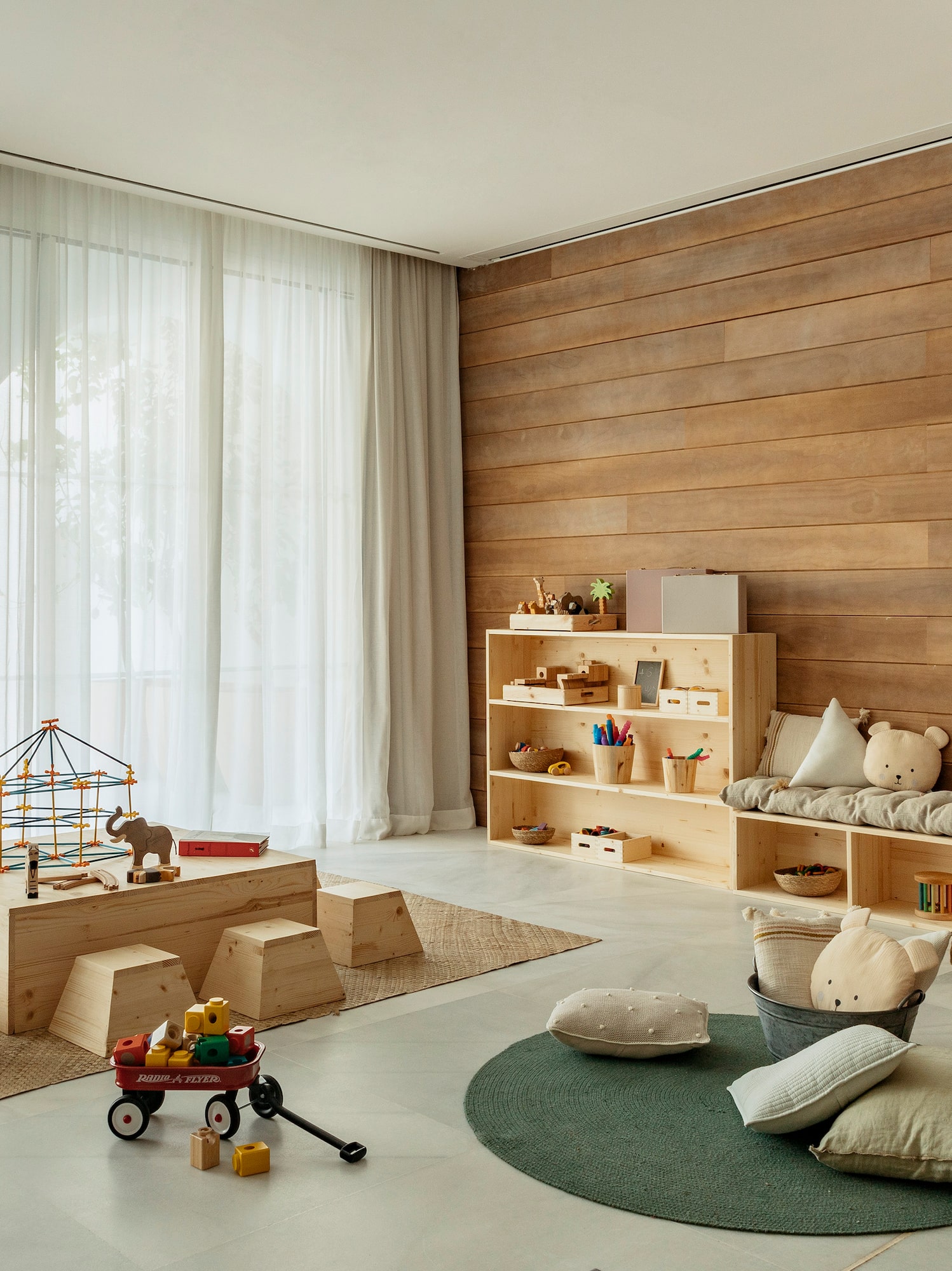 a room with a large wooden wall and a large window