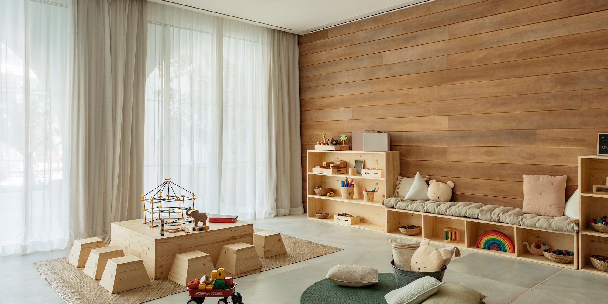 a room with a large wooden wall and a large window