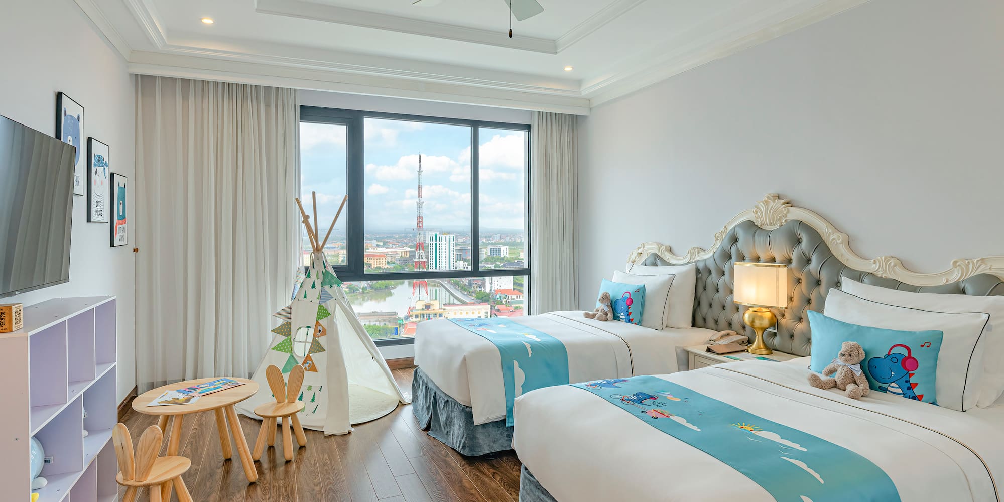 a bedroom with two beds and a tent