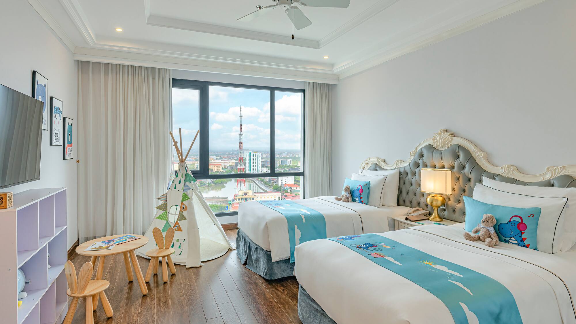 a bedroom with two beds and a tent