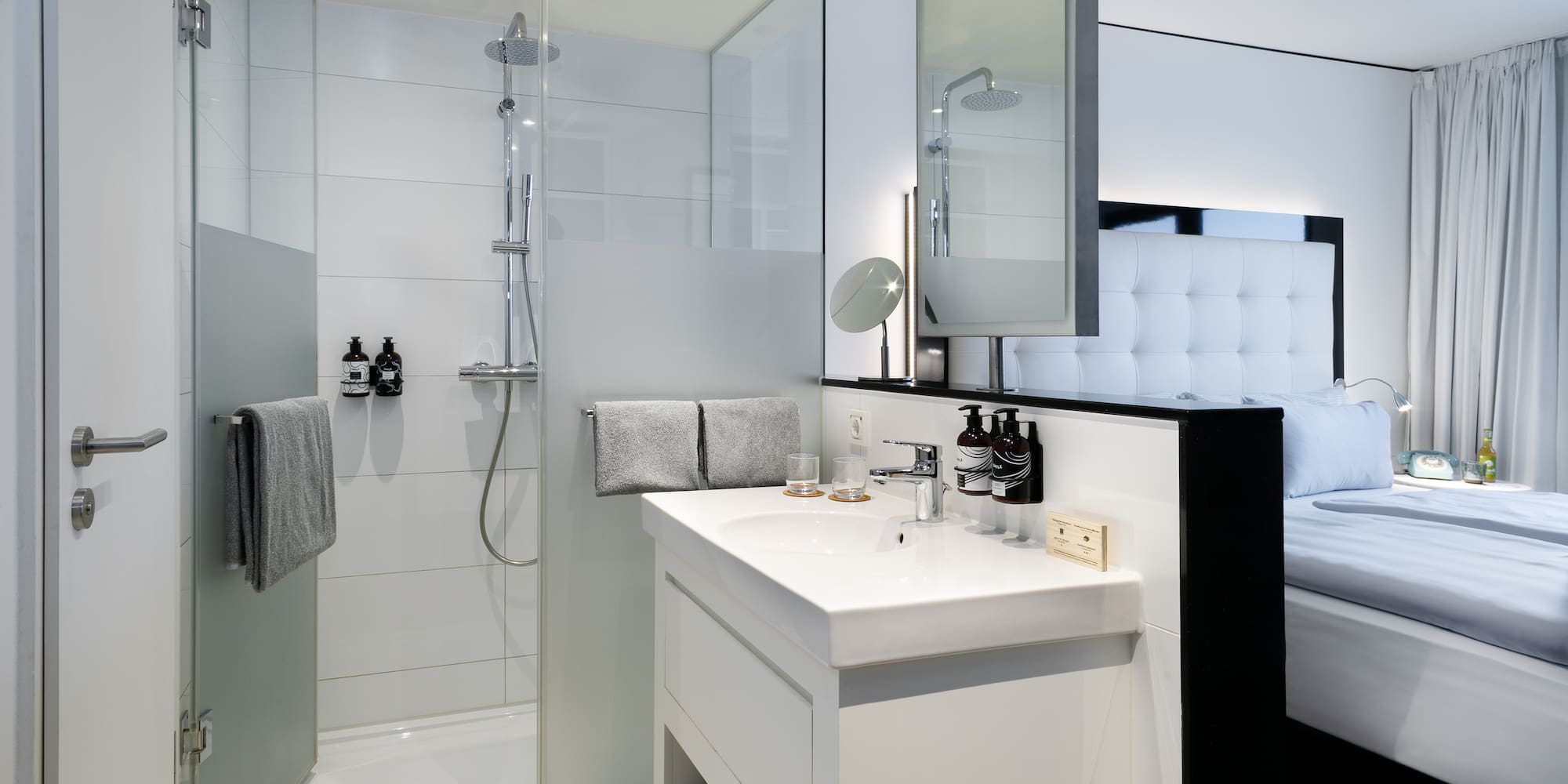 a bathroom with a shower and sink