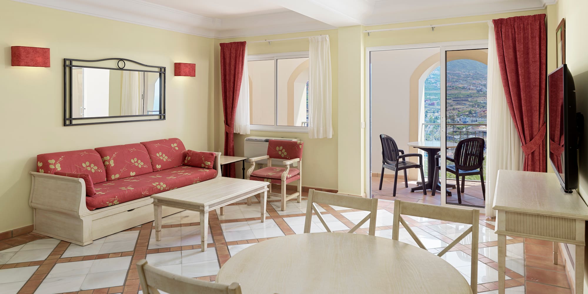 a living room with a couch and a table