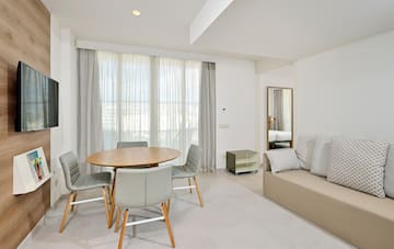 a room with a table and chairs