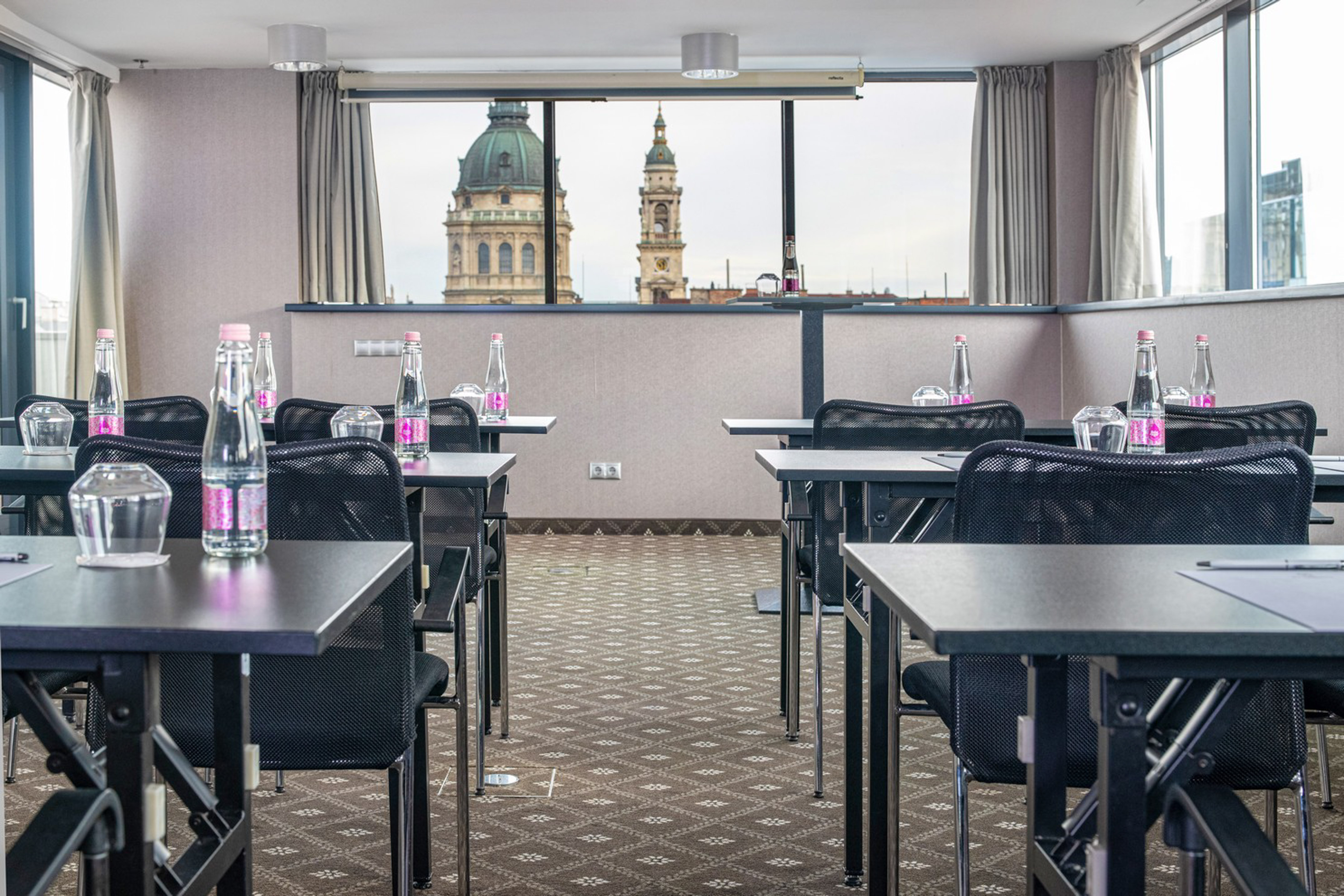 a room with tables and chairs