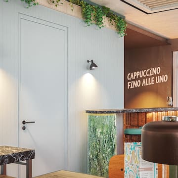 a room with a white door and a marble counter