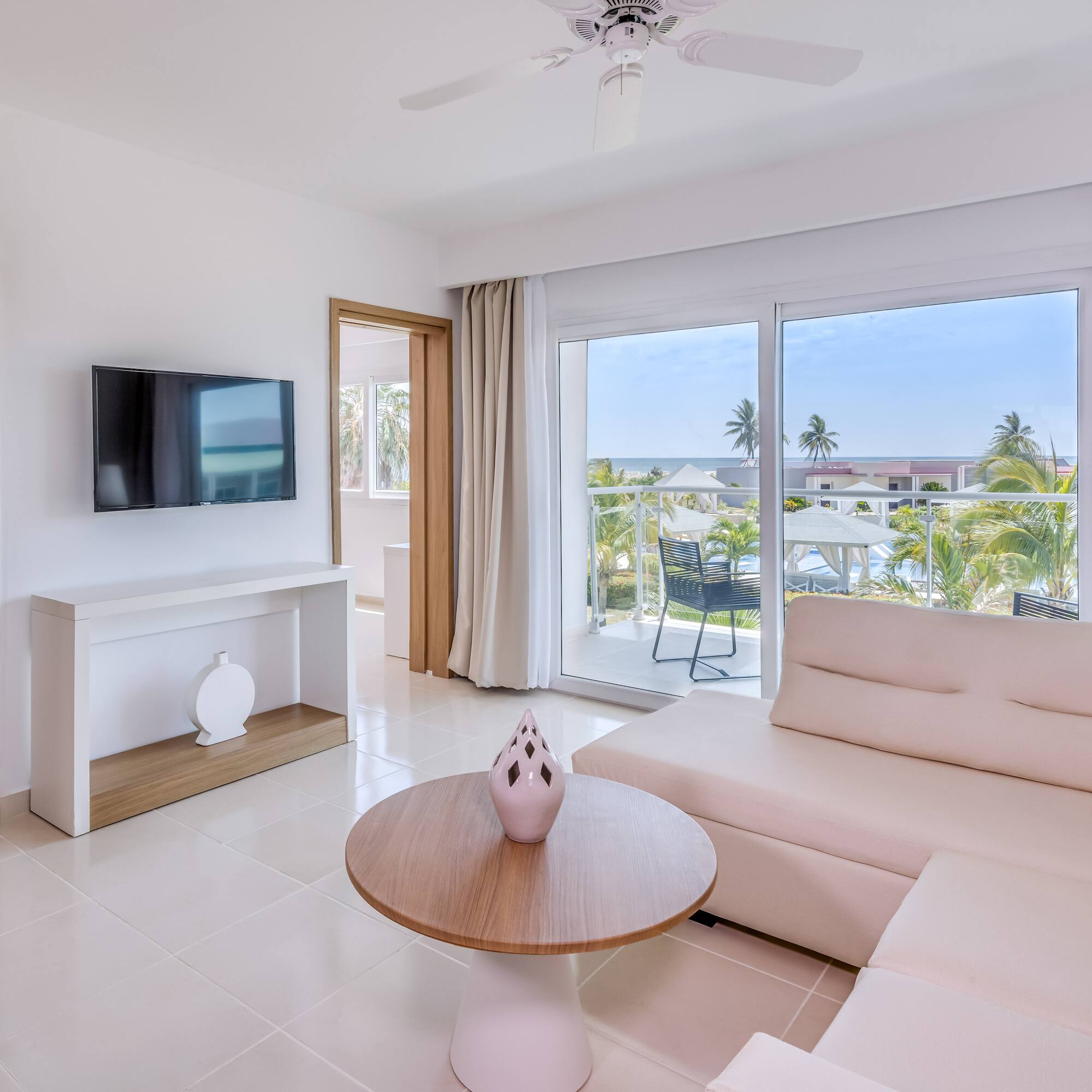a living room with a television and a couch