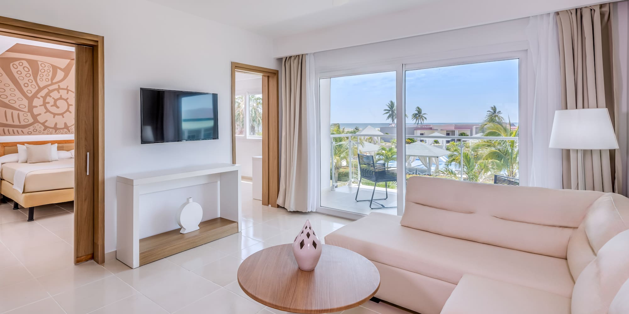 a living room with a television and a couch