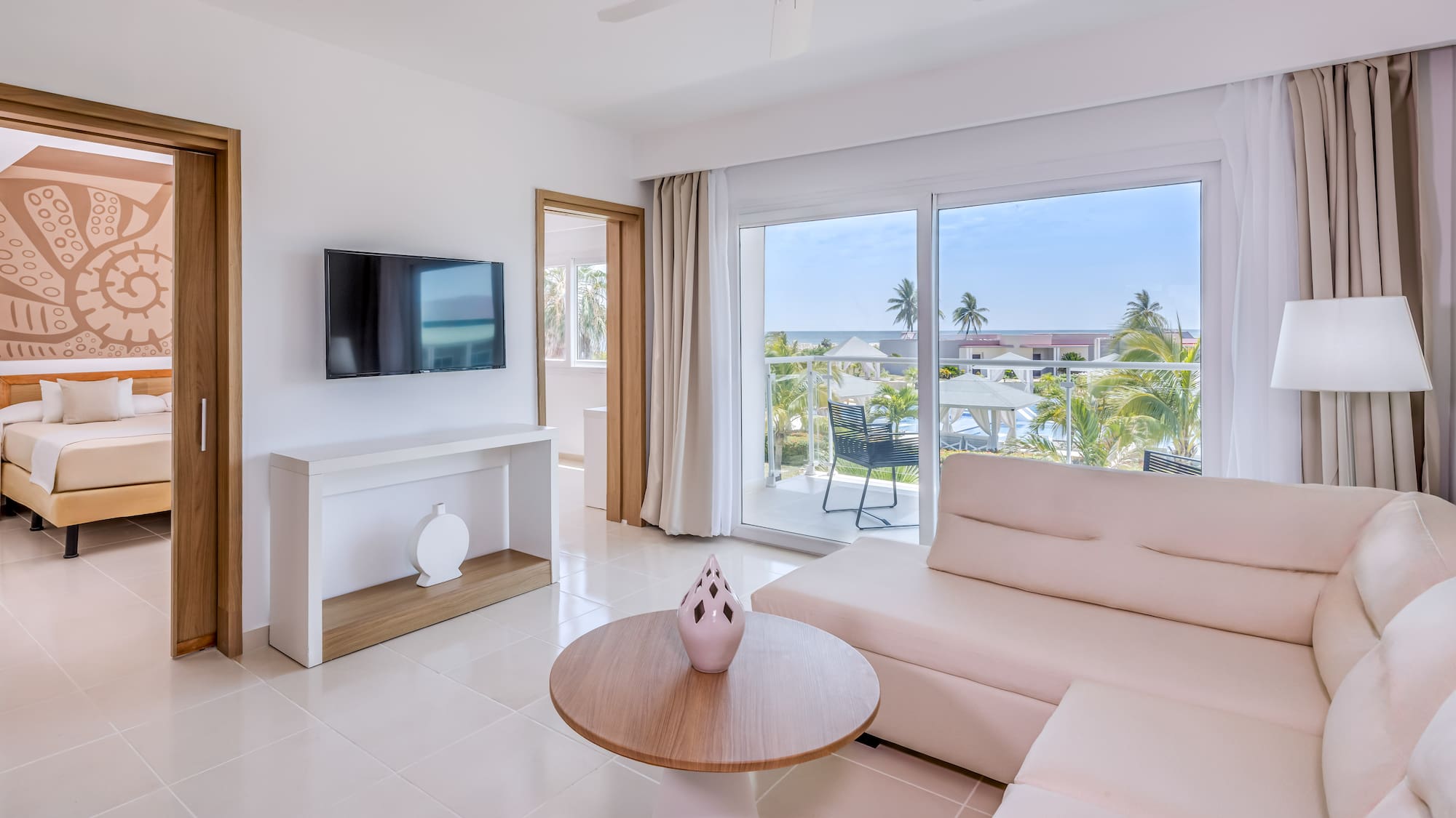 a living room with a television and a couch